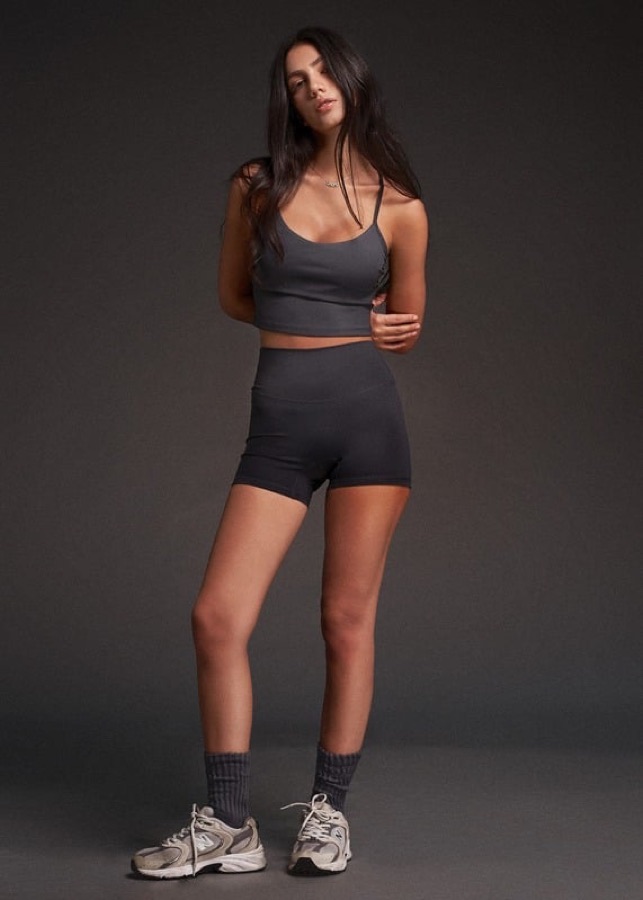 Grey sports bra with charcoal biker shorts
